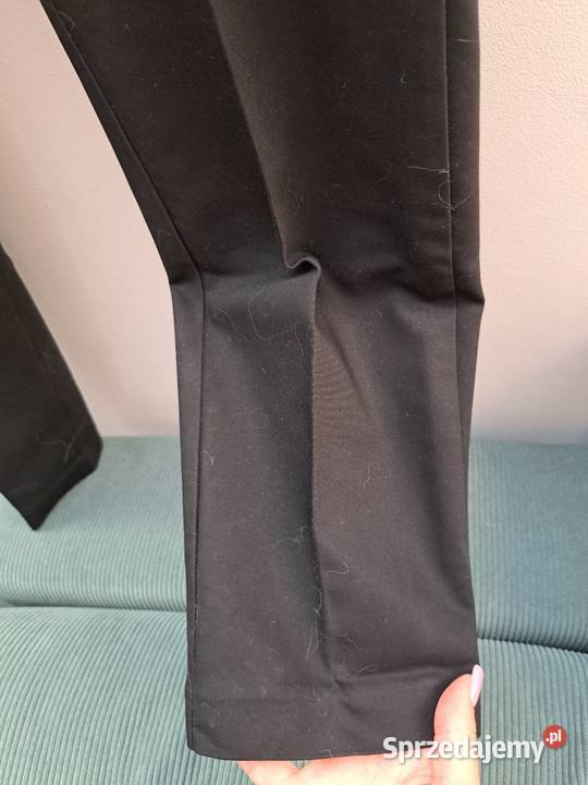 Eleganckie czarne spodnie damskie HM 42 L Spodnie Trąbki Wielkie