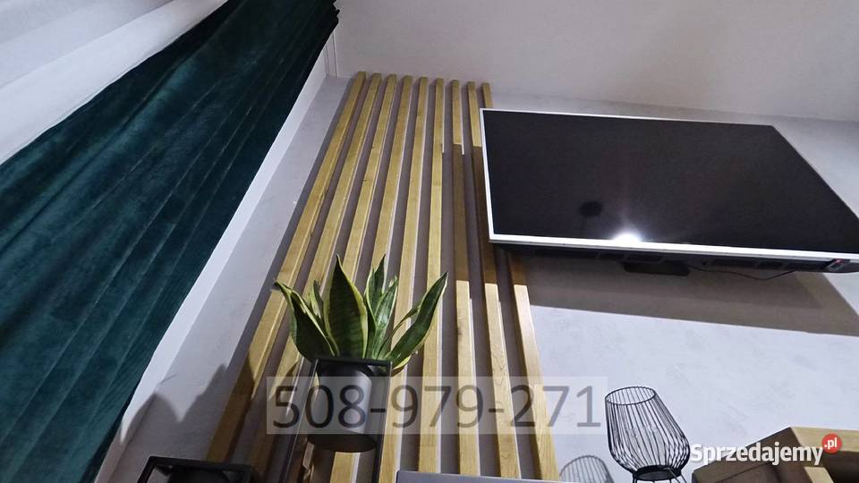 Lamele drewniane MDF montaż aranżacja ścian Warszawa