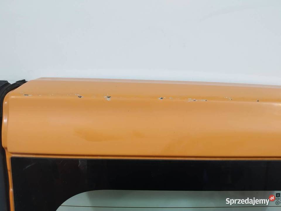 DRZWI PRAWE TYŁ POMARAŃCZOWE SKRZYDEŁKO Opel Części samochodowe