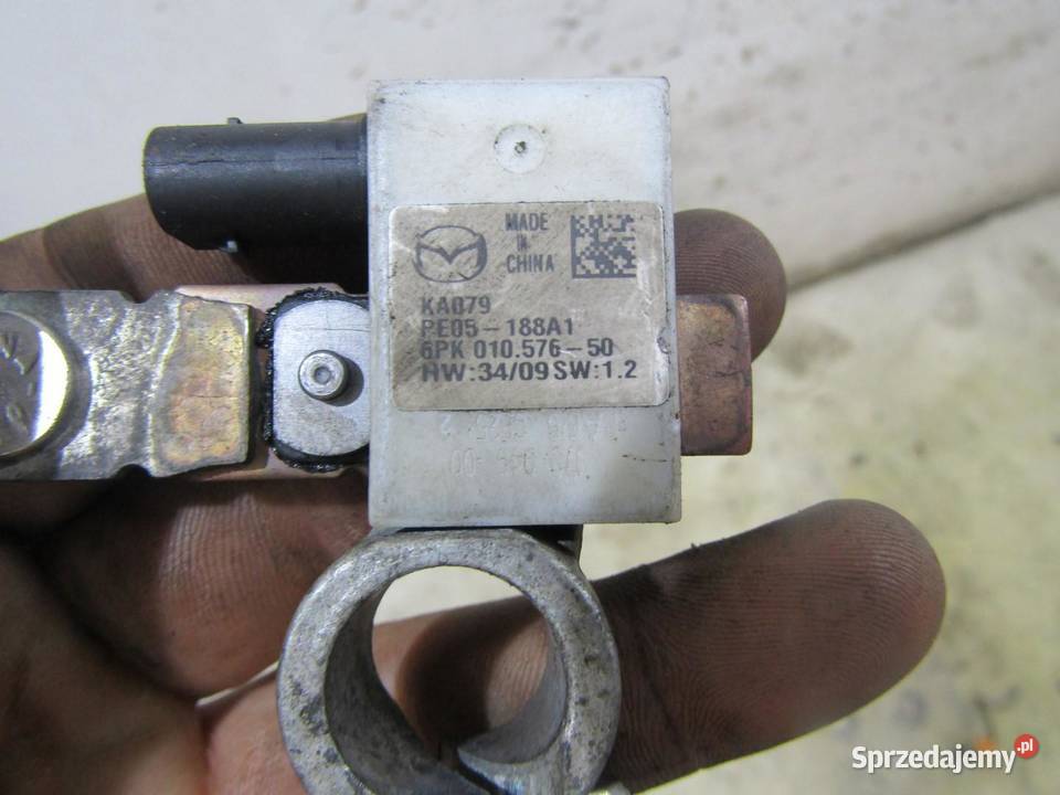 KLEMA MINUSOWA MAZDA 3 BM BN PE05188A1 osobowe Materiały instalacyjne