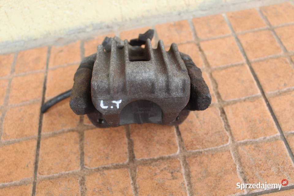 ZACISK HAMULCOWY LEWY TYŁ VW BEETLE 20B wielkopolskie