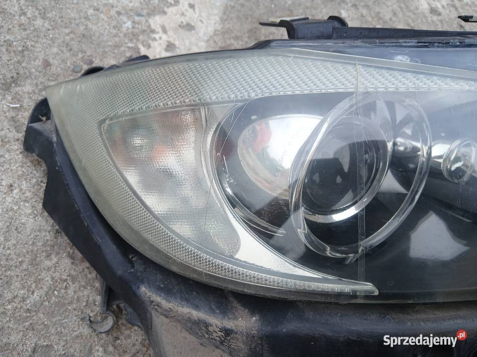 Prawa lampa przednia przód BMW E90 E91 BiXenon osobowe Radłów