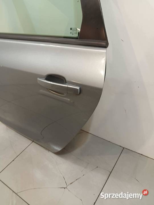 DRZWI LEWE TYŁ KOMBI Z179 Opel Astra IV 2009