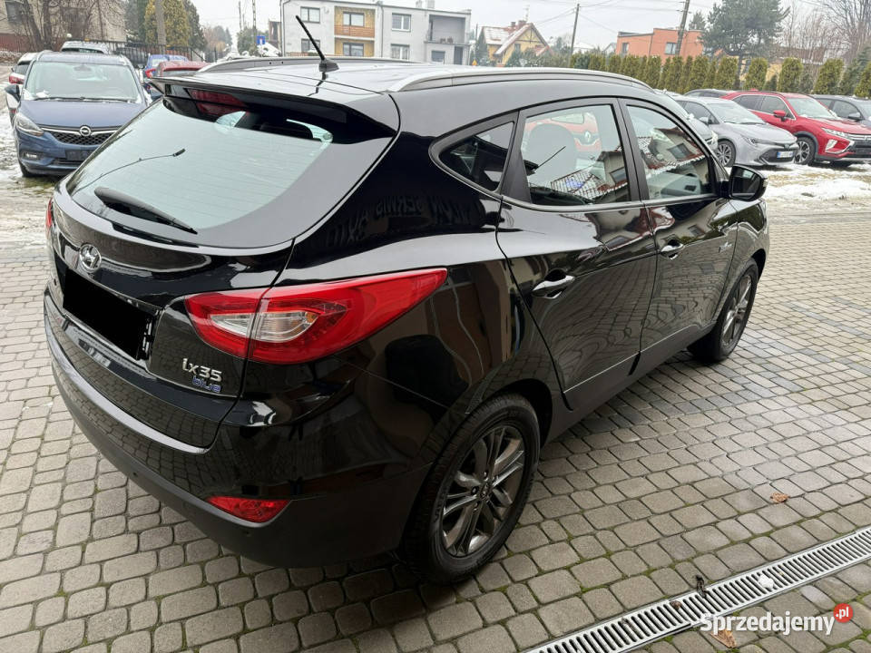 Hyundai ix35 16 135 Klimatronik Serwis Koła centralny zamek Orzech