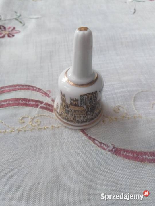 Mały porcelanowy dzwonek kolekcjonerski Miejsce Piastowe