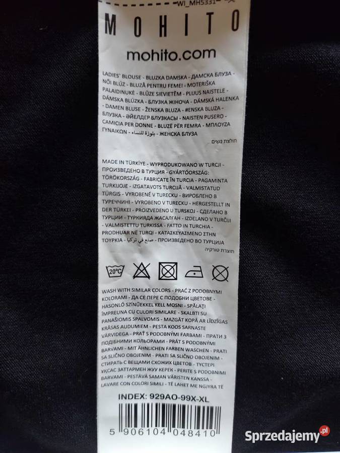 Elegancka czarna bluzka z białą lamówką Wrocław