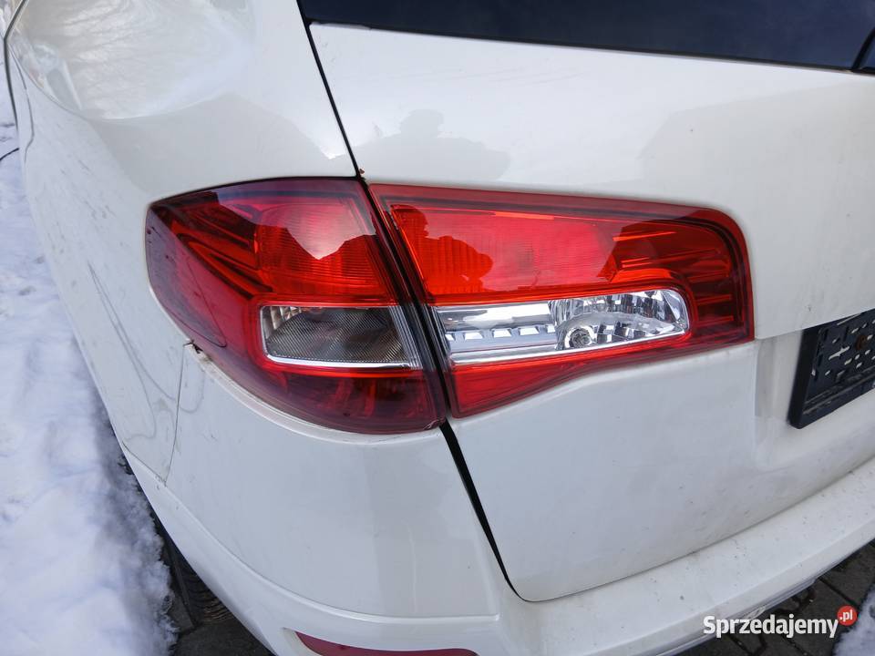 Lampa tylna tył Renault Koleos 2010 lewa w klapę lewe Szczerbice
