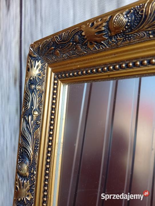 lustro z złotej ramie 428
