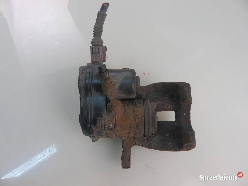 ZACISK PRAWY TYŁ AUDI A4 B8 18 TFSI CABB Układ hamulcowy