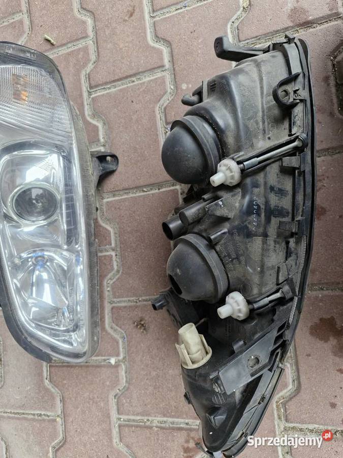 Lampy przednie Opel Omega B FL soczewki Wieluń