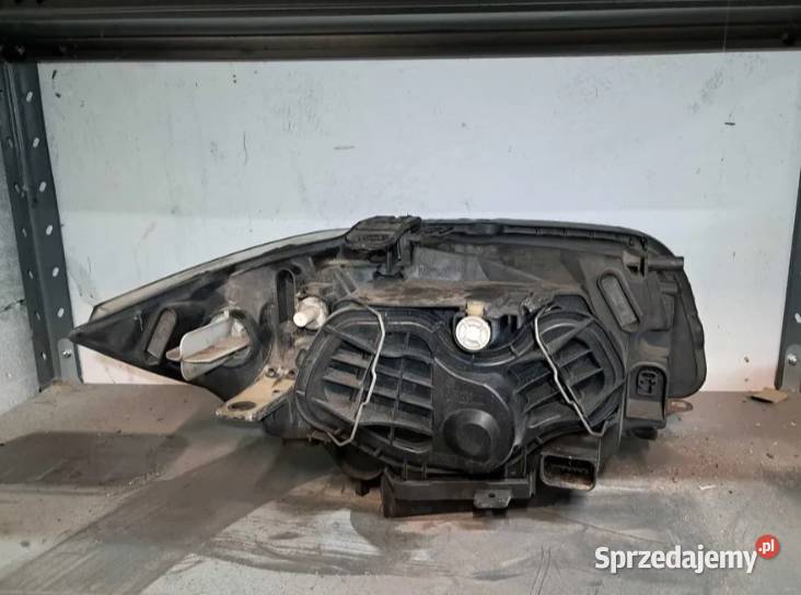 Lampa przód przednia Reflektor Lewy lewa BMW 1 podkarpackie Chrząstów
