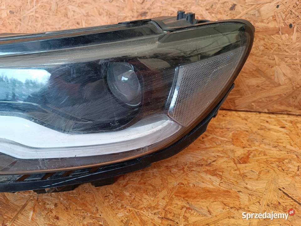 LAMPA LEWY PRZÓD REFLEKTOR XENON 0053434536 JEEP Nowy Tomyśl