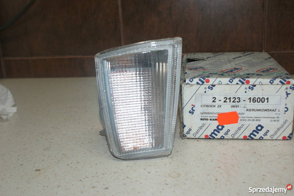 KIERUNKOWSKAZ BIAŁY LEWY CITROEN ZX NOWY osobowe Karoseria Białobrzegi