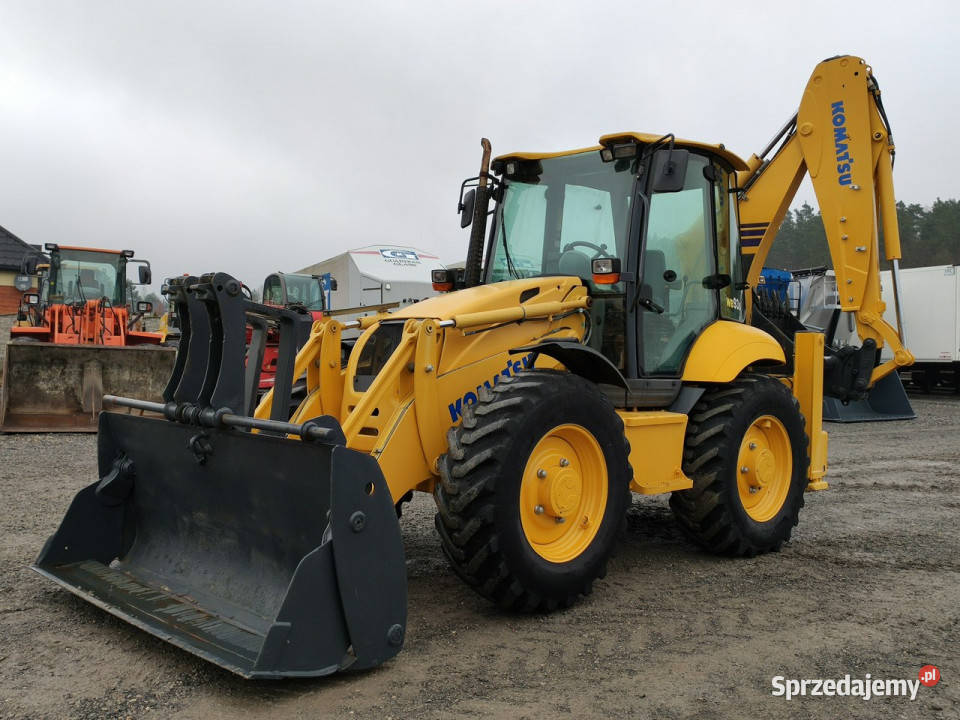 na równych kołach Komatsu WB 93S5E0 Bez Luzów Widełki