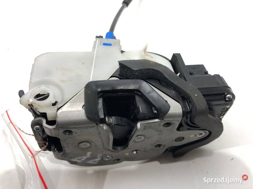 ZAMEK DRZWI PRAWY PRZÓD OPEL ASTRA J Kombi 1015