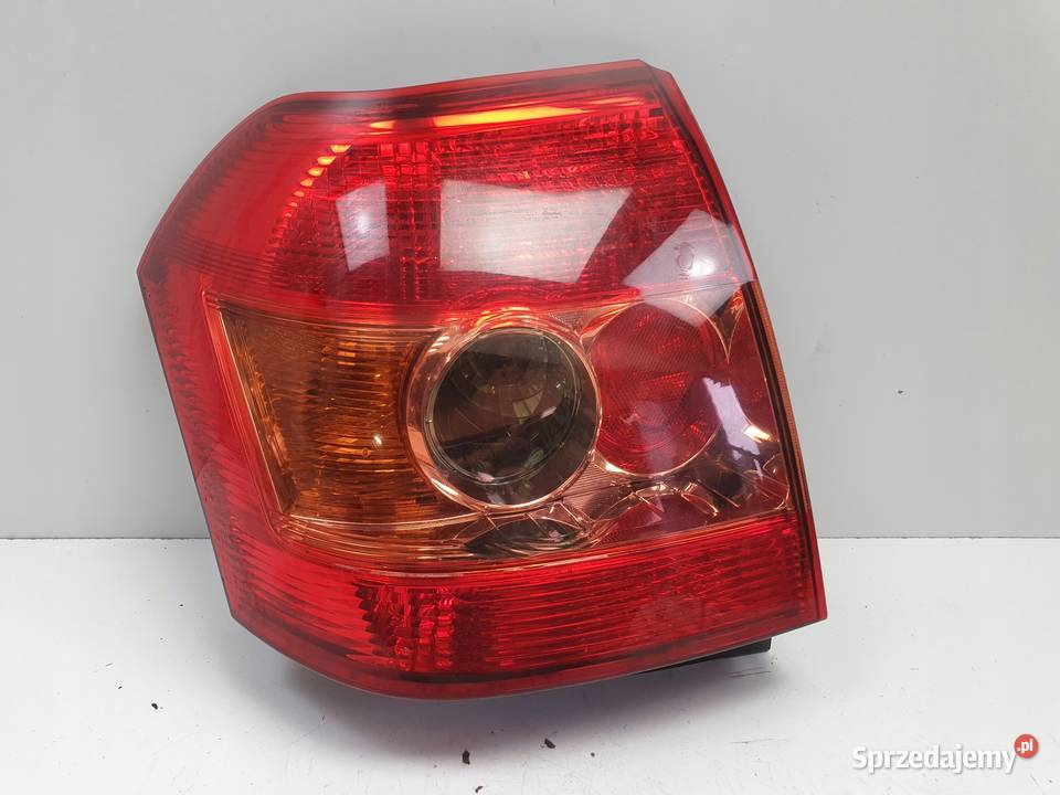 Toyota Corolla E12 LIFT TYLNIA TYLNA LAMPA LEWA Rudka sprzedam