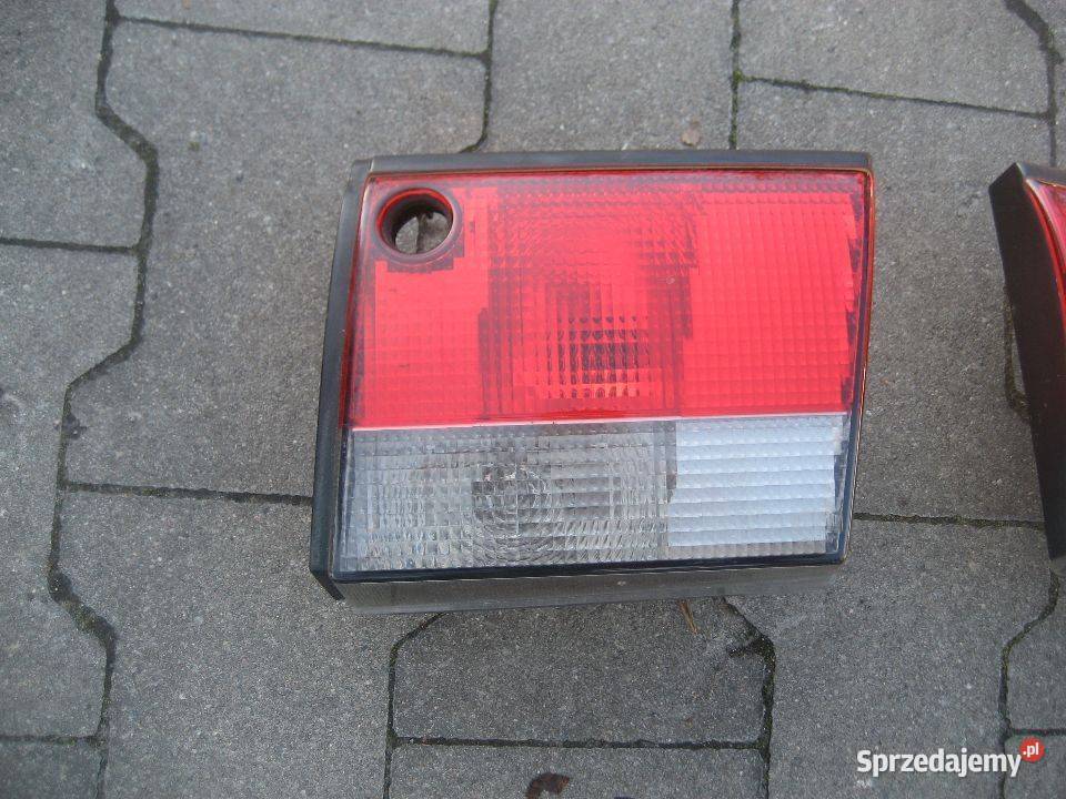 saab 900 9396r lampy tył prawa lewa klapa Rakoniewice sprzedam