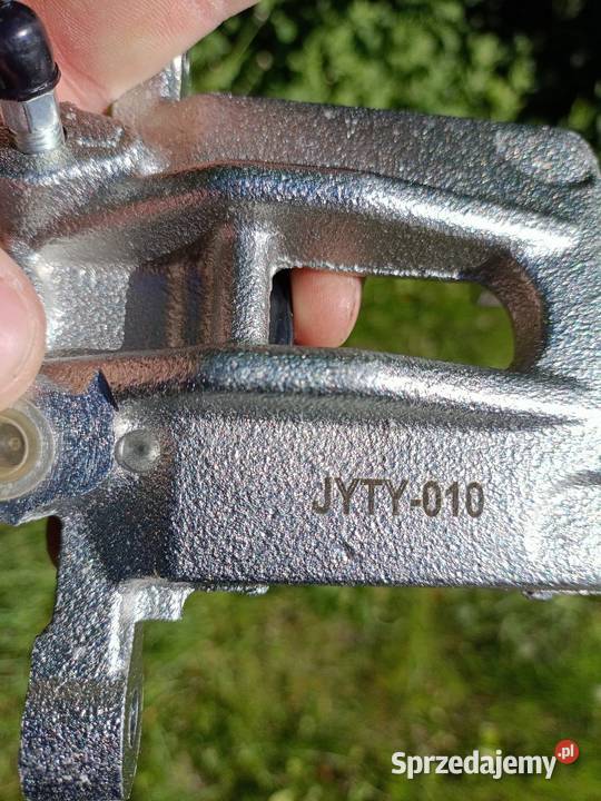 Zaciski z klockami tył do Corolli e12 z 2005r Pasłęk