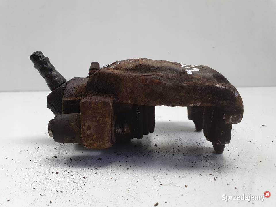 Volvo S60 I V70 II TYLNY ZACISK HAMULCOWY lewy