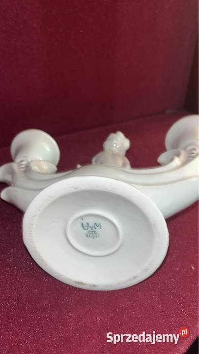 Świecznik z Putto grający na złotym flecie Syg Gdańsk