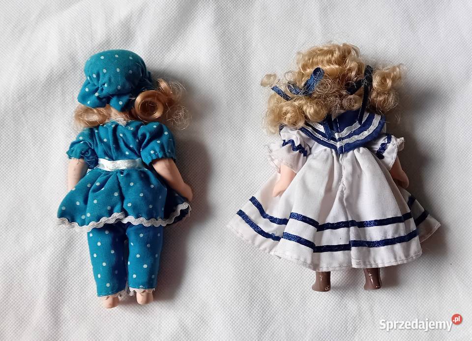 Dwie porcelanowe lalki w strojach wiktoriańskich Porcelana i szkło Koźminek