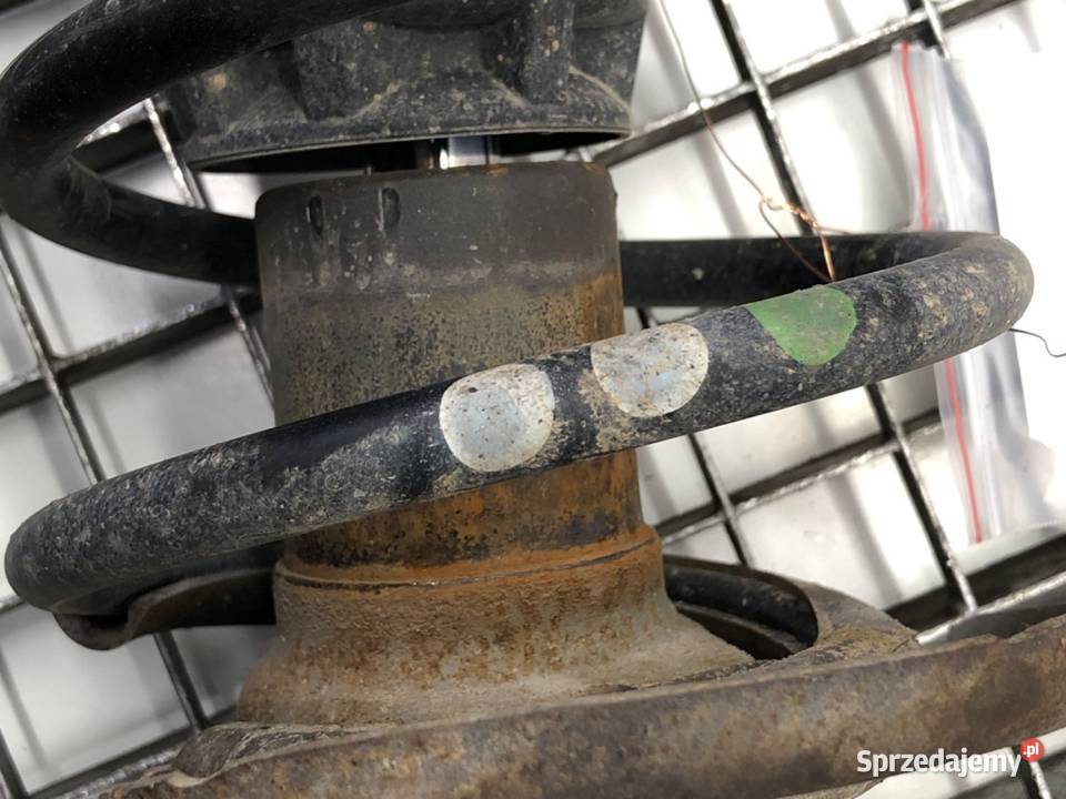 AMORTYZATOR PRAWY PRZÓD ZE SPRĘŻYNĄ PEUGEOT 207