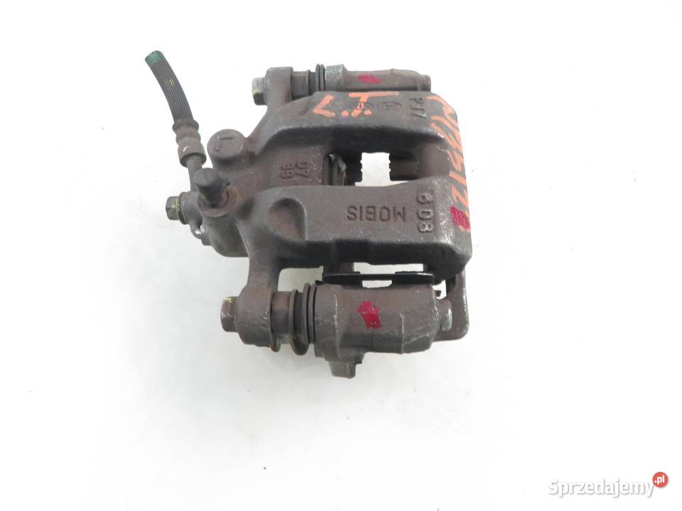 ZACISK LEWY TYŁ KIA SPORTAGE IV osobowe