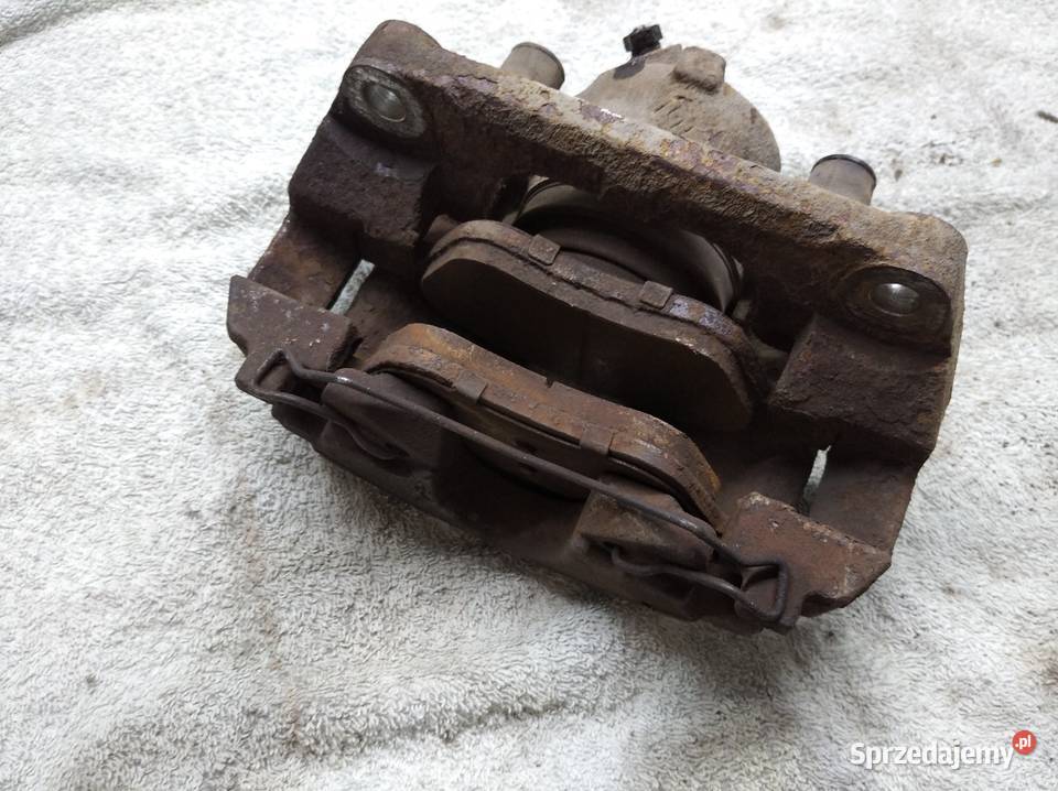 Laguna III zacisk hamulca prawy przód Swarzędz