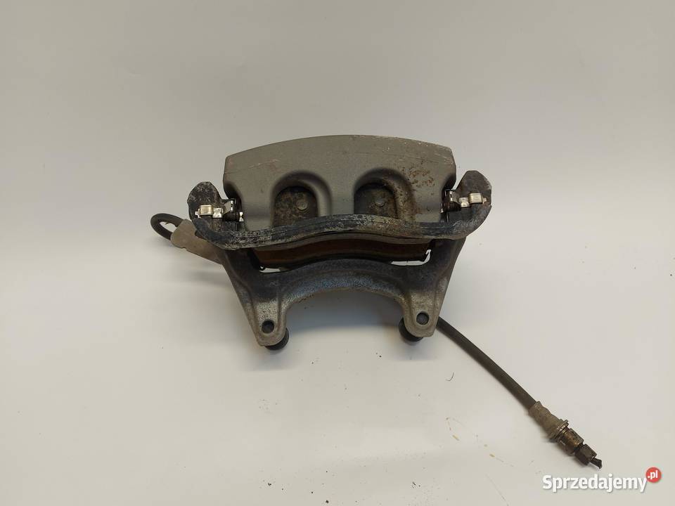 TESLA MODEL Y 2022 Zacisk hamulcowy przód lewy osobowe sprzedam