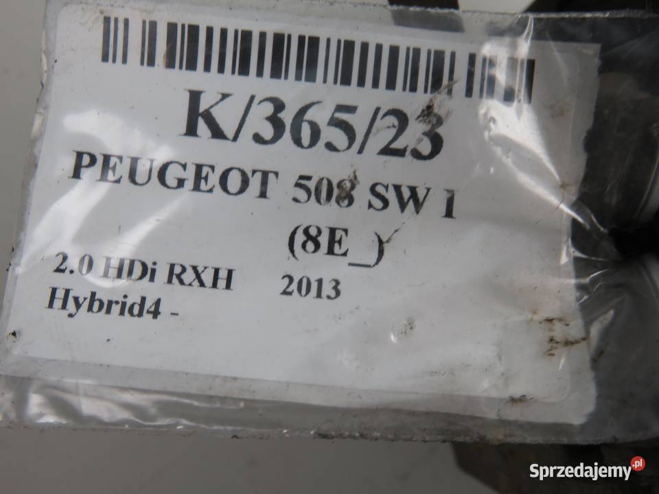 ZACISK LEWY TYŁ PEUGEOT 508 Hybrid4 030784