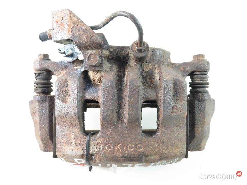 ZACISK LEWY PRZÓD MITSUBISHI L200 II 25 TD