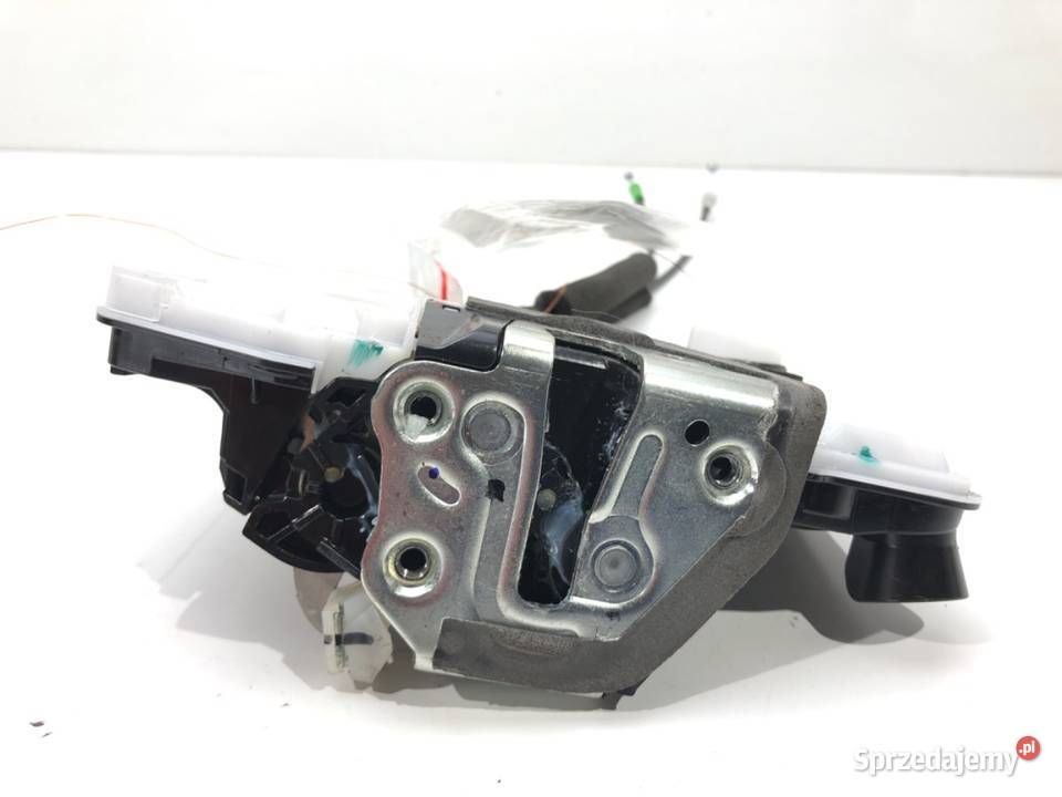 ZAMEK DRZWI PRAWY PRZÓD TOYOTA COROLLA E21