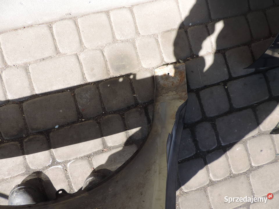 SUZUKI LIANA BŁOTNIK LEWY PRZÓD PRZEDNI Z2U osobowe
