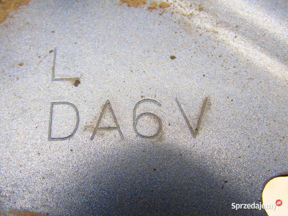 MOCOWANIE BŁOTNIKA LEWY PRZÓD 44J MAZDA 2 DJ