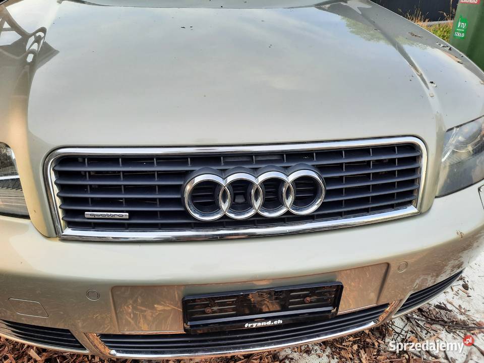 QUATTRO Znaczek emblemat na atrapę Audi A4 B6 osobowe Szczerbice