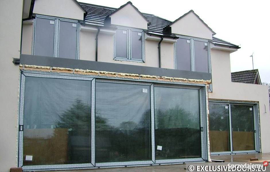 Drzwi aluminiowe przesuwne Schco ASS 70HI Design Budownictwo i akcesoria małopolskie Piwniczna-Zdrój