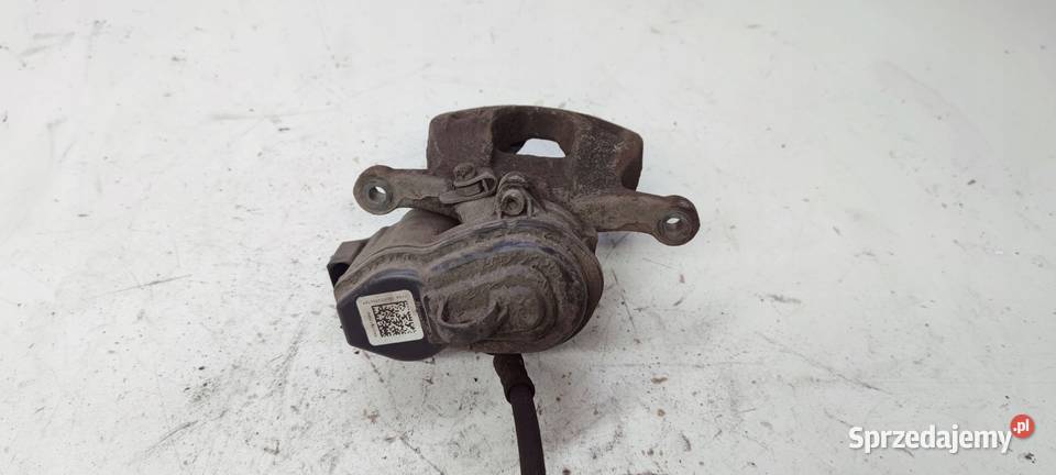ZACISK HAMULCOWY LEWY AUDI A4 B9 A5 8W0615405AA osobowe Przystajń sprzedam