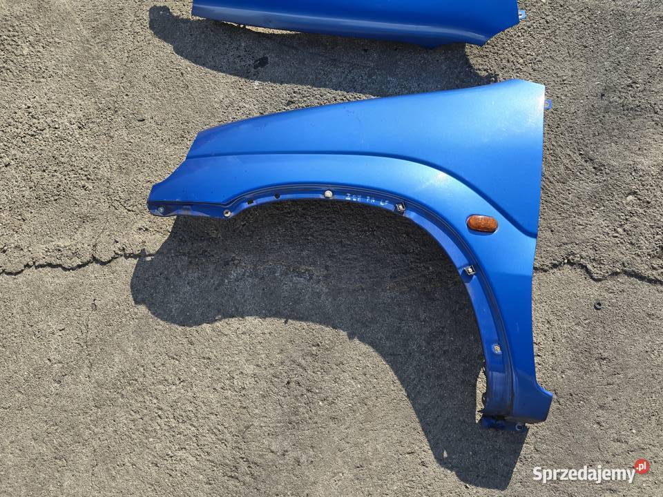 Suzuki Ignis FH 0003 błotnik błotniki przednie Legnica