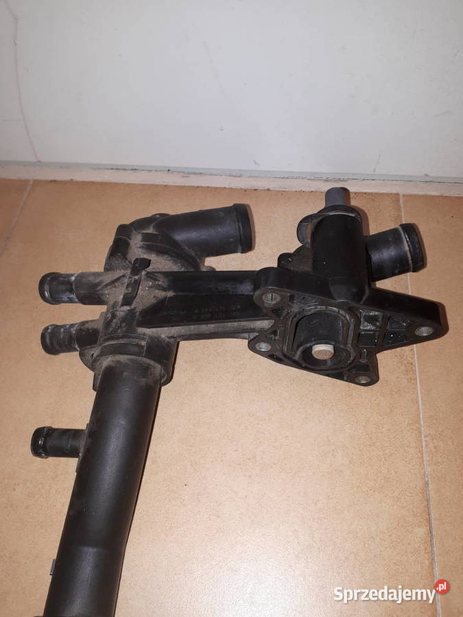 03C121026S OBUDOWA TERMOSTATU 14 TSI CAXA CAVD Silniki i osprzęt