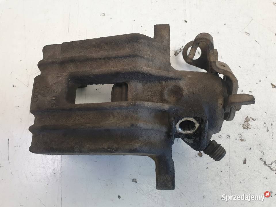 Skoda Octavia I ZACISK HAMULCOWY prawy TYŁ TYLNY Janów