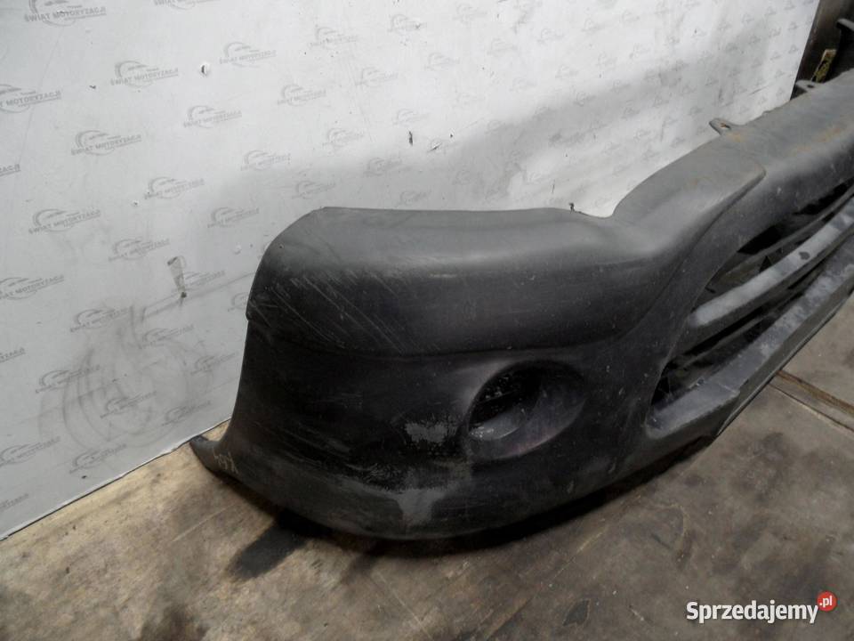 NISSAN VANETTE E 02r zderzak przód Zestawy części blacharskich