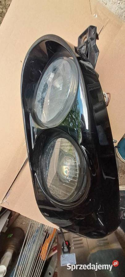 Reflektor lewy Hella projektor golf 3 osobowe