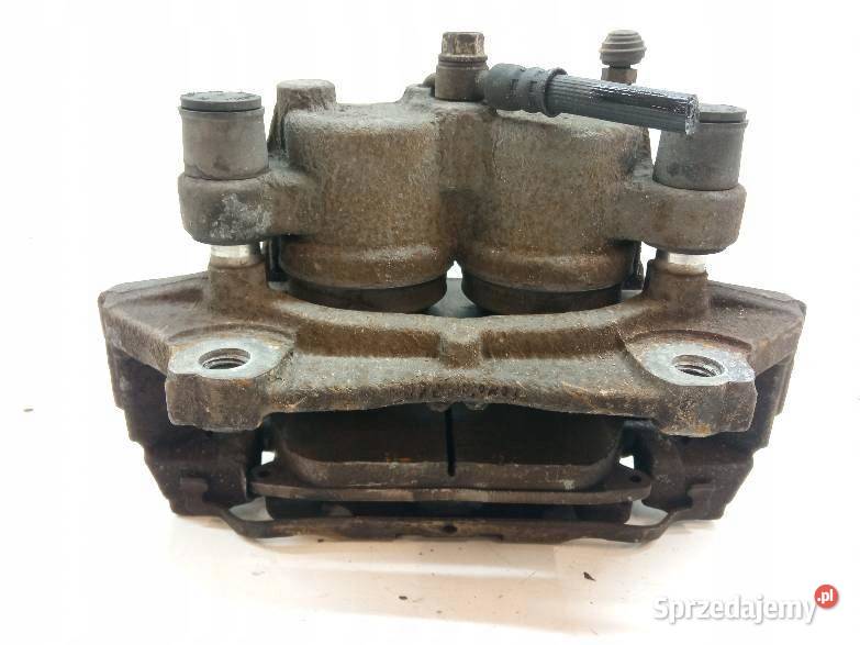 ZACISK HAMULCOWY LEWY PRZÓD 20 TDCI E1GC2010LD Zaciski i jarzma