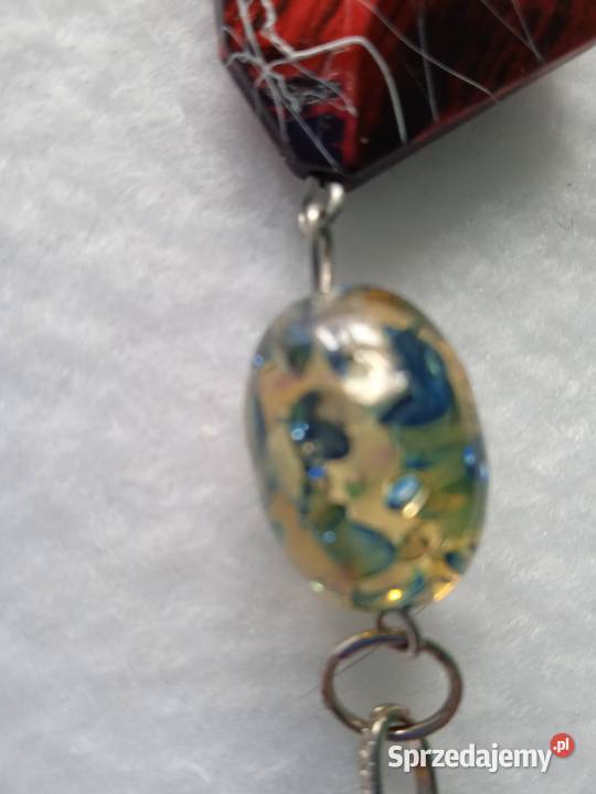 NASZYJNIK Z EFEKTOWNYMI DOMINANTAMI Piła