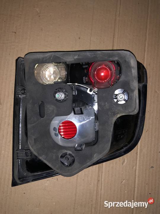 Lampa w klape VW TOUAREG 28269003 osobowe Lampy tylne Kozy