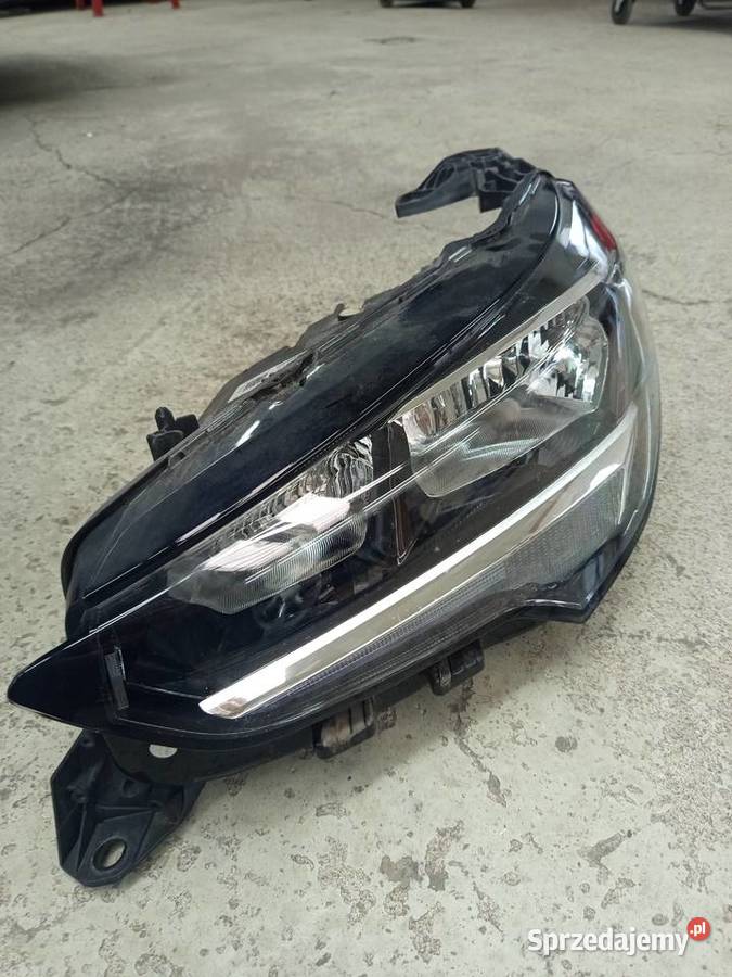 Reflektor lewy corsa f orginalny lewe Rzeszów