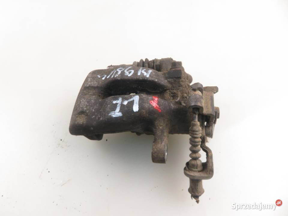 ZACISK LEWY TYŁ OPEL COMBO C 13 CDTI 16V Z 13