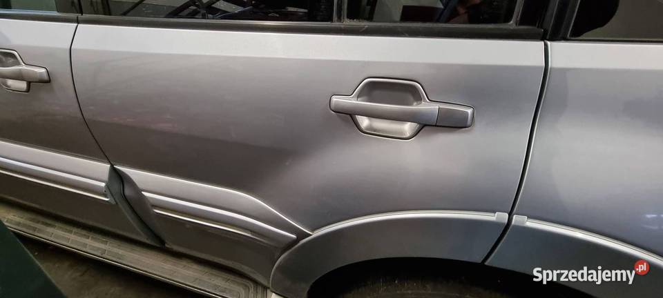 DRZWI LEWE TYŁ MITSHUBISHI PAJERO IV V90 A19 Lipno