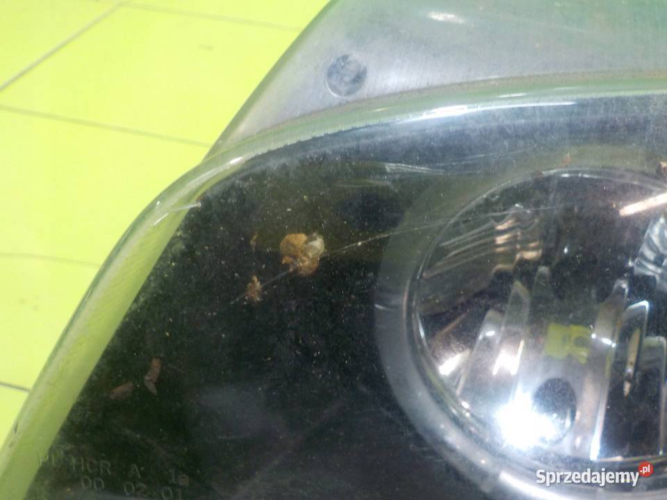 BMW 3 E46 9903 lampa lewa przod Suków