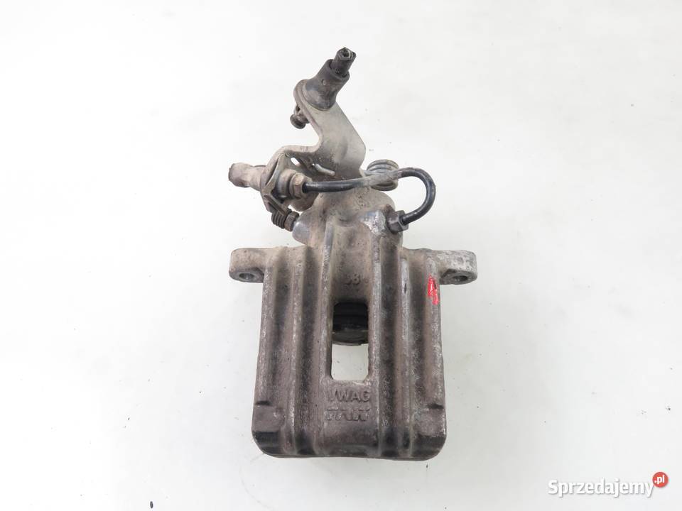 ZACISK PRAWY TYŁ VW GOLF V 1K1 19 TDI BXE